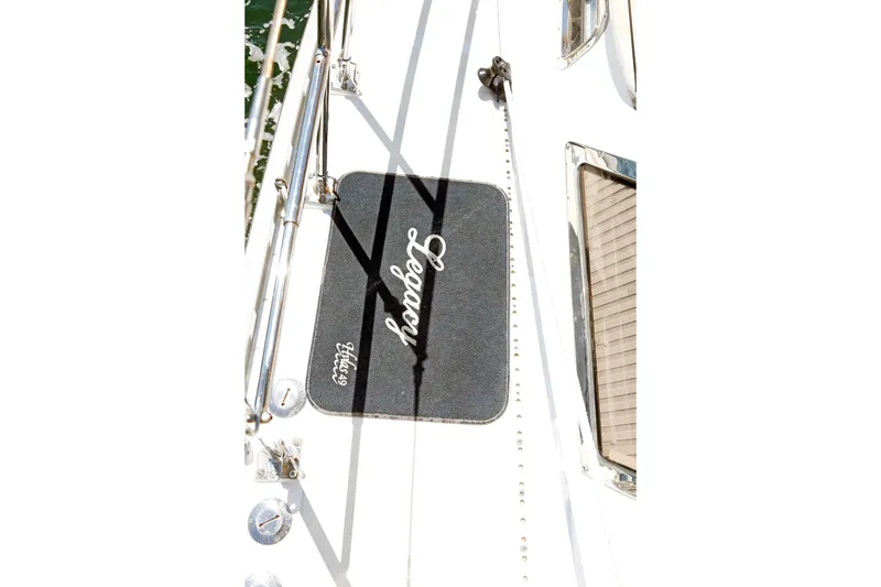 Slide: The Image of Deck of 2012 Hylas 49CC yacht with branded mat and railing. - 84