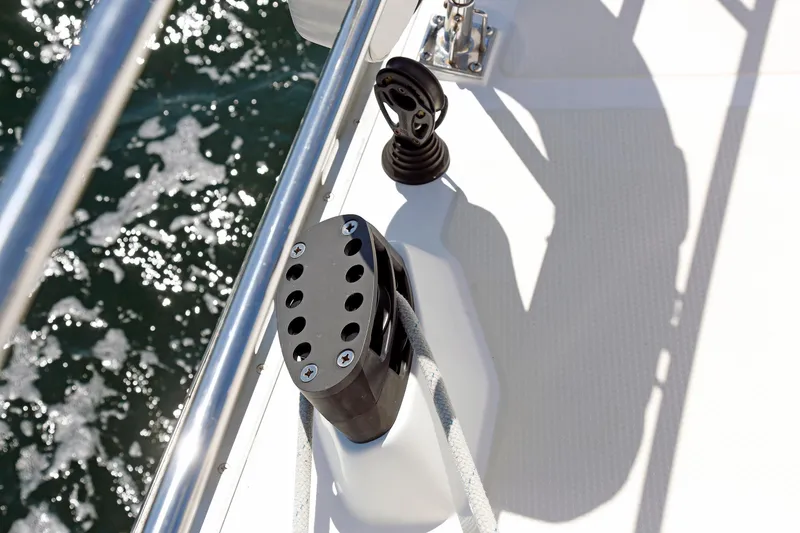 Slide: The Image of Deck of 2012 Hylas 49CC yacht with rope cleat and railing. - 85