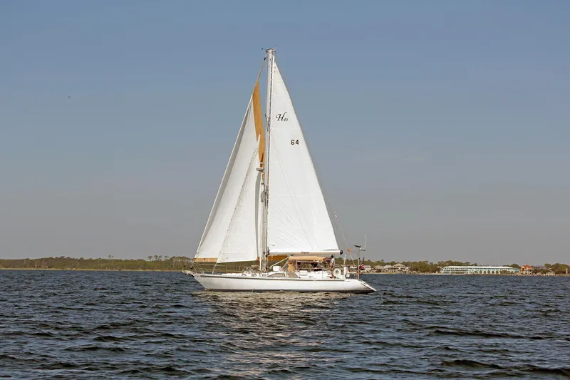 Slide: The Image of Sailing yacht Hylas 49CC 2012 gliding on open water under clear skies. - 9