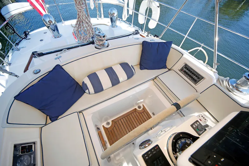 Slide: The Image of Luxurious 2012 Hylas 49CC yacht cockpit with plush seating and nautical decor. - 92
