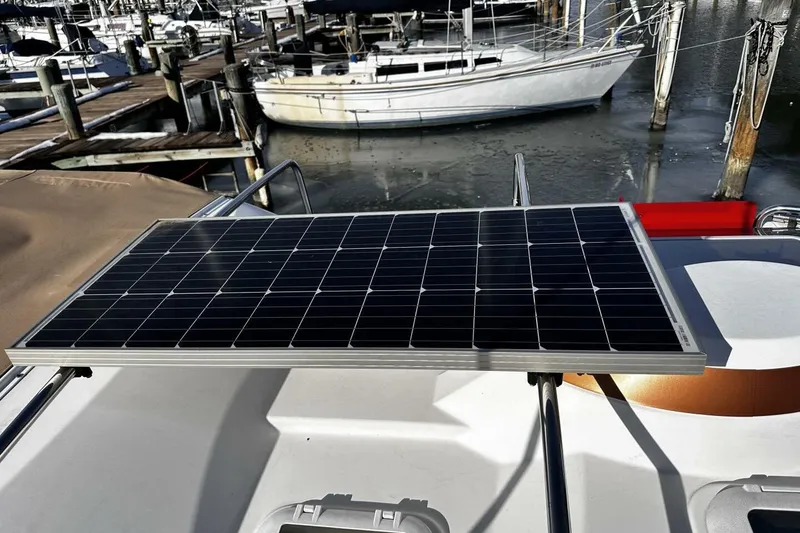 Slide: The Image of Solar panel on 2019 Ranger Tugs R-23 boat docked at marina. - 22
