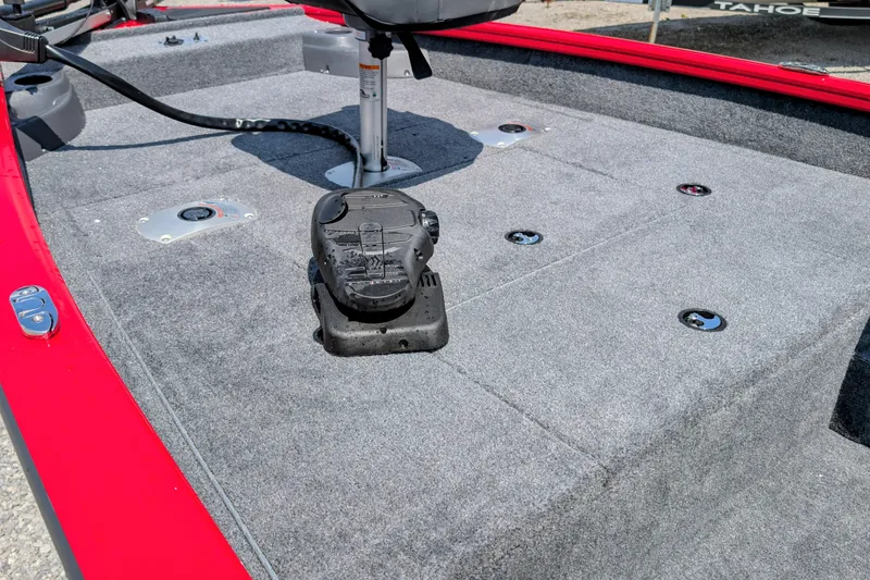 Slide: The Image of 2026 Tracker Pro Team 175 Crappie Edition boat interior with gray carpet and red trim. - 5