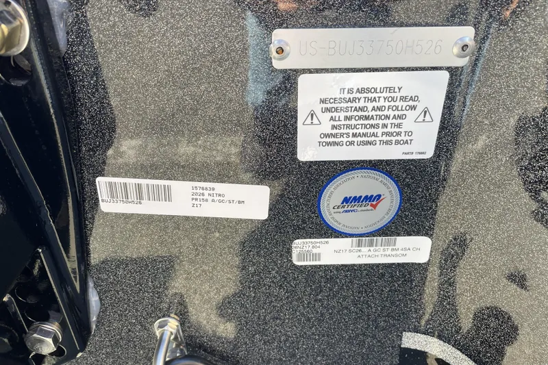 Slide: The Image of 2026 Nitro Z17 boat transom with safety and certification labels. - 106