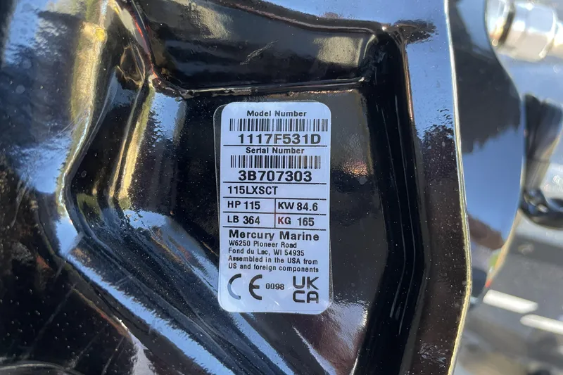 Slide: The Image of Label on Mercury Marine engine, model 115LXSCT, 115 HP, assembled in USA. - 107