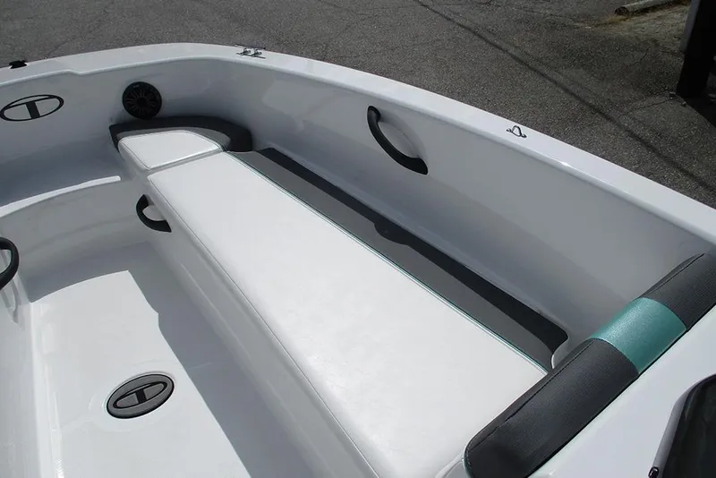 Slide: The Image of 2026 Tahoe T18 boat interior with white seating and black accents. - 13