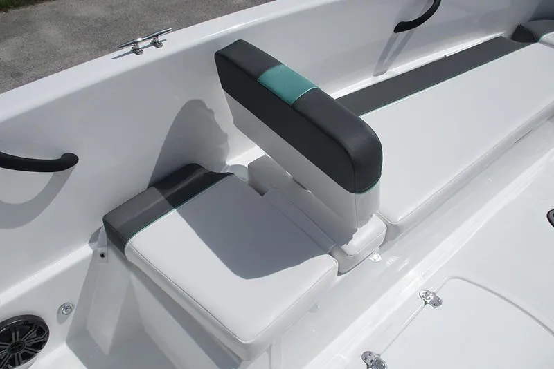 Slide: The Image of 2026 Tahoe T18 boat interior with white and teal seating. - 15