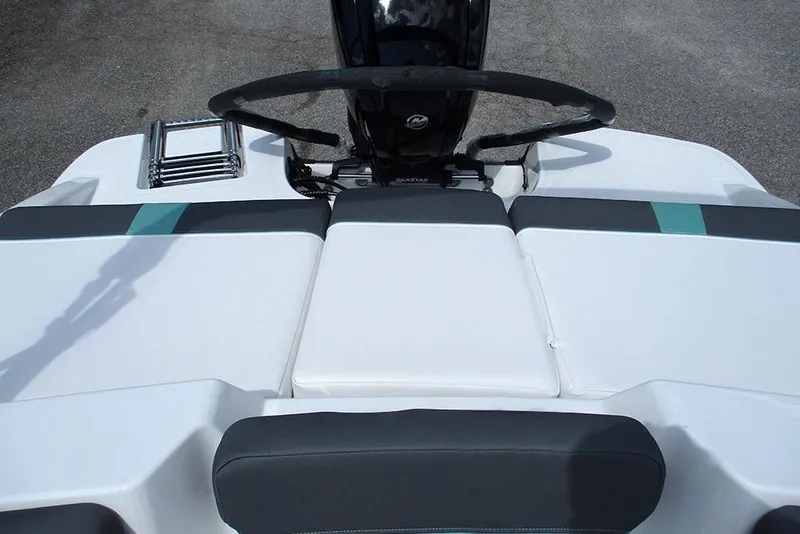 Slide: The Image of 2026 Tahoe T18 boat interior with steering wheel and seating area. - 22