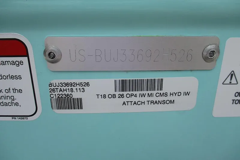 Slide: The Image of 2026 Tahoe T18 identification plate with serial and model numbers. - 27