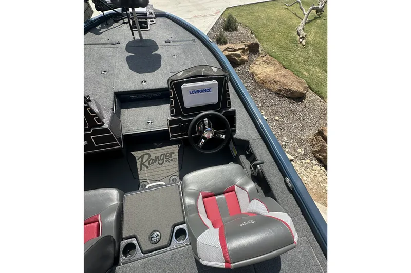 Slide: The Image of 2025 Ranger ALPHA 208 boat interior with Lowrance display and stylish seating. - 9