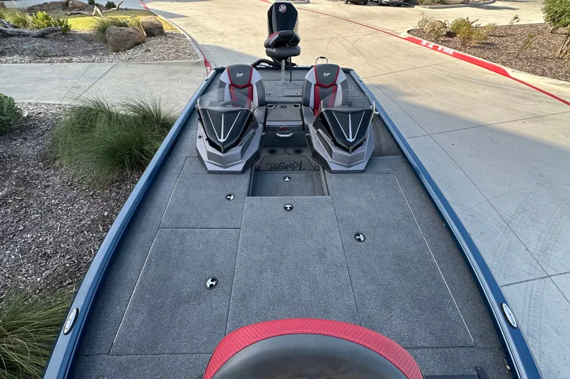 Slide: The Image of 2025 Ranger ALPHA 208 boat interior with seating and storage compartments. - 28
