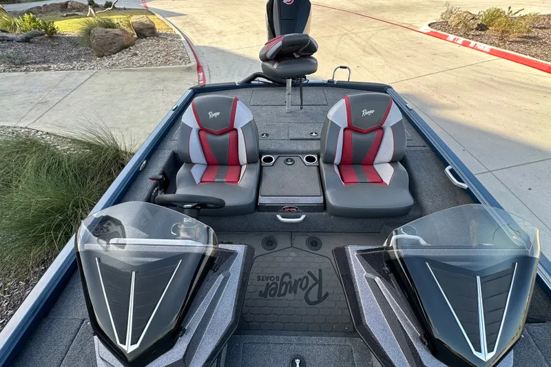 Slide: The Image of 2025 Ranger ALPHA 208 boat interior with dual seats and sleek design. - 29
