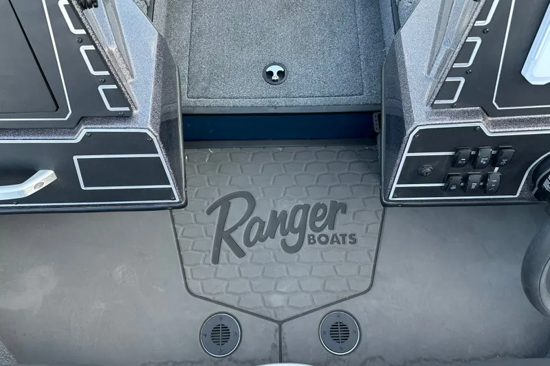 Slide: The Image of Interior view of 2025 Ranger ALPHA 208 boat with logo on floor mat. - 30