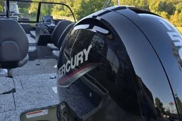 Slide: The Image of 2026 Tracker Targa V-18 Combo boat with Mercury engine, interior view. - 7