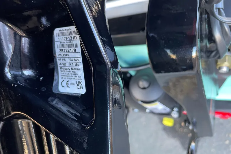 Slide: The Image of Close-up of a 2026 Tahoe T18 engine label with specifications and serial number. - 71