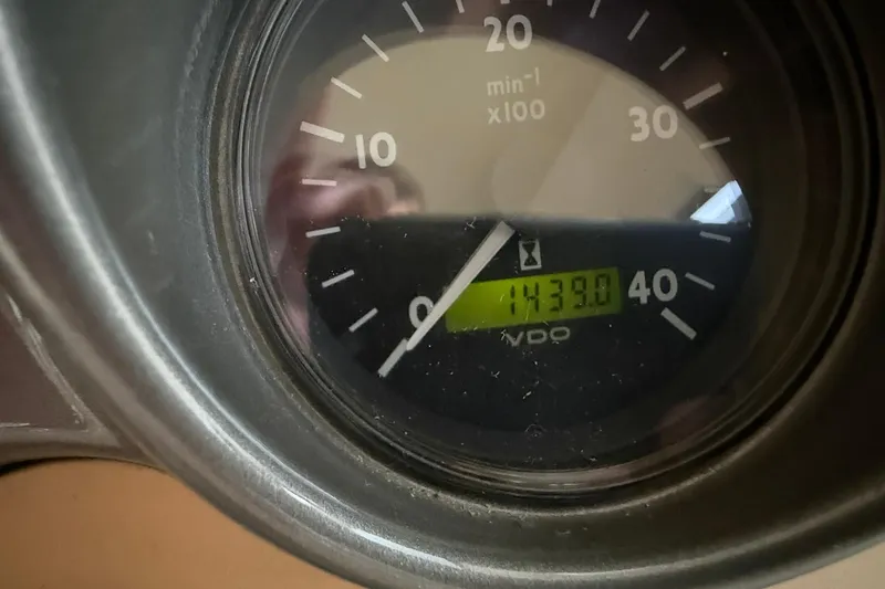 Slide: The Image of Close-up of a 2006 Azimut 50 boat tachometer displaying 1439.0 hours. - 13