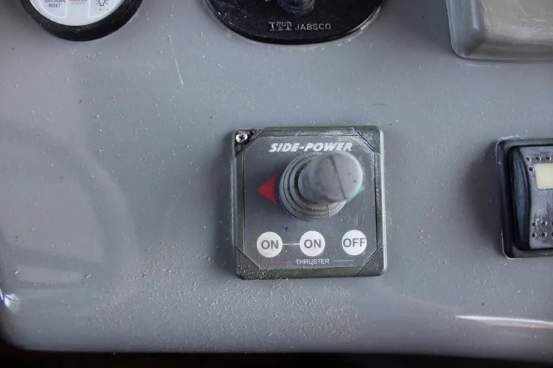 Slide: The Image of Control panel of a 2006 Azimut 50 yacht with Side-Power thruster joystick. - 17