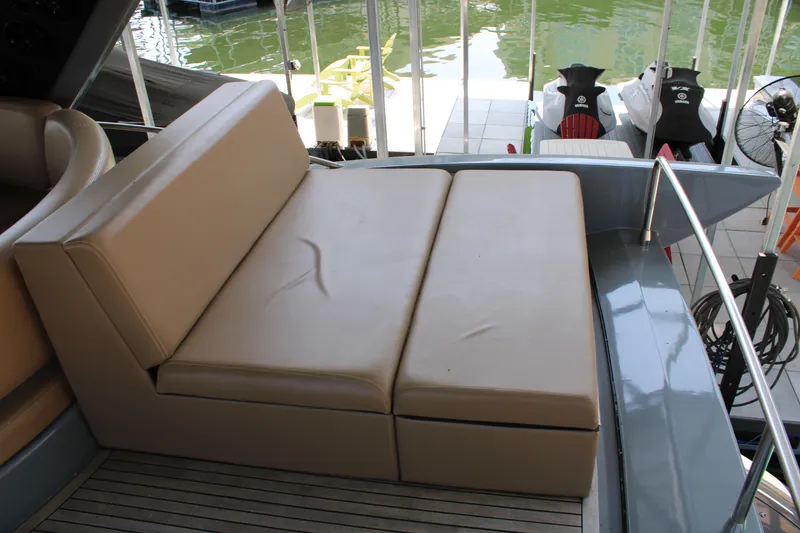 Slide: The Image of Luxury seating area on 2006 Azimut 50 yacht, featuring beige cushions and sleek design. - 24