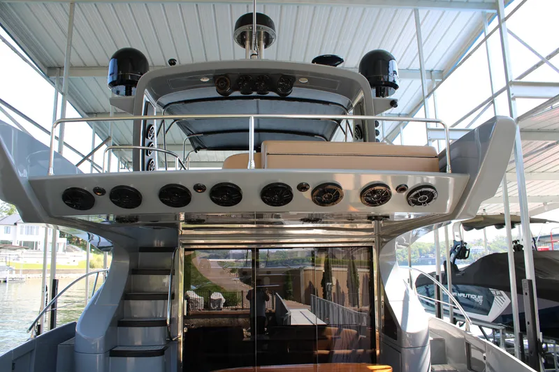 Slide: The Image of Azimut 50 yacht, 2006 model, docked under a covered marina. - 6