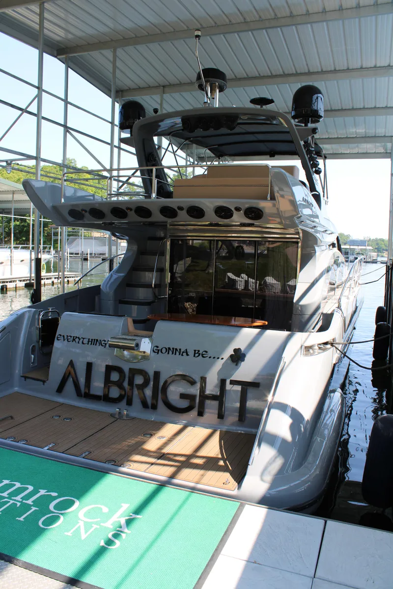 Slide: The Image of Azimut 50 yacht, 2006 model, docked under a covered marina. - 7