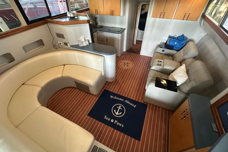 Slide: The Image of Cozy cabin interior of 1996 Mainship 40 Sedan Bridge with a comfortable bed. - 43