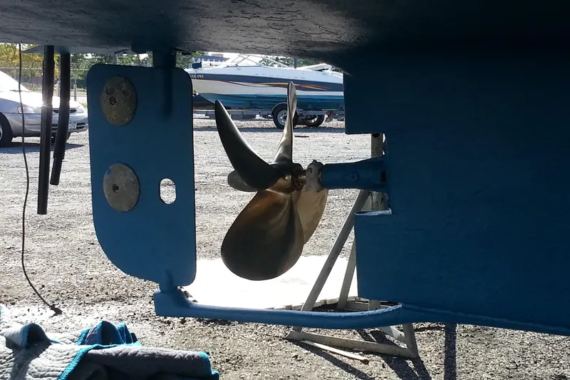 Slide: The Image of Propeller and rudder of 1979 Mainship 34 Custom Sedan boat on dry dock. - 26