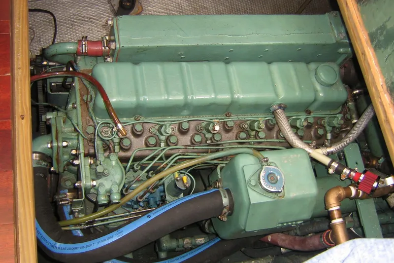 Slide: The Image of 1979 Mainship 34 Custom Sedan engine, showcasing detailed mechanical components. - 29