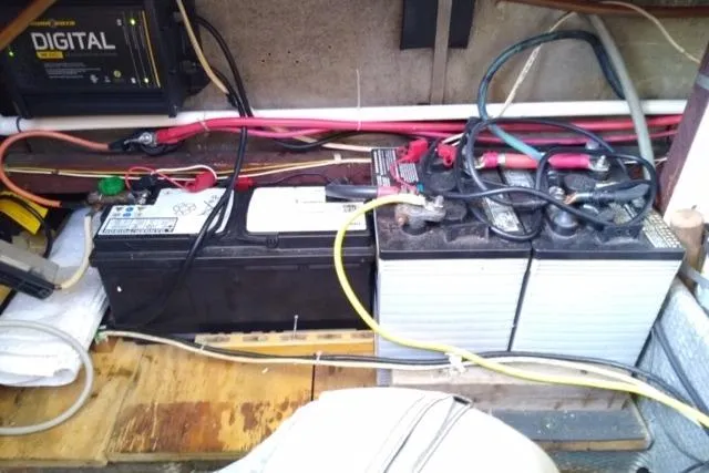 Slide: The Image of Battery setup in a 1979 Mainship 34 Custom Sedan boat. - 31