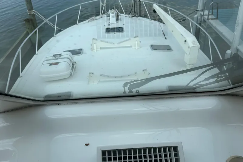 Slide: The Image of 1999 Riviera Convertible SF boat deck view with railing and equipment. - 29