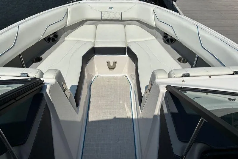 Slide: The Image of 2020 Regal LS4 boat interior with white seating and modern design. - 14