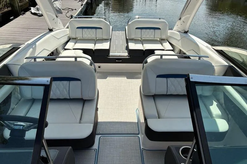 Slide: The Image of 2020 Regal LS4 boat interior with luxurious seating and modern design. - 15