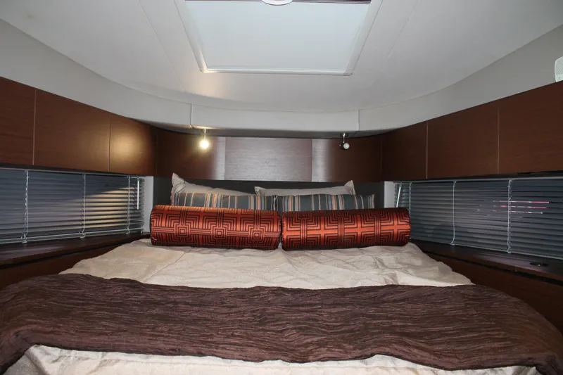 Slide: The Image of Luxurious interior cabin of 2015 Sea Ray 470 Sundancer yacht with cozy bedding. - 102