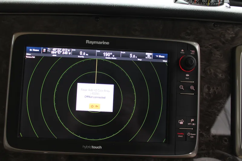 Slide: The Image of Raymarine radar display on 2015 Sea Ray 470 Sundancer boat, showing navigation details. - 114