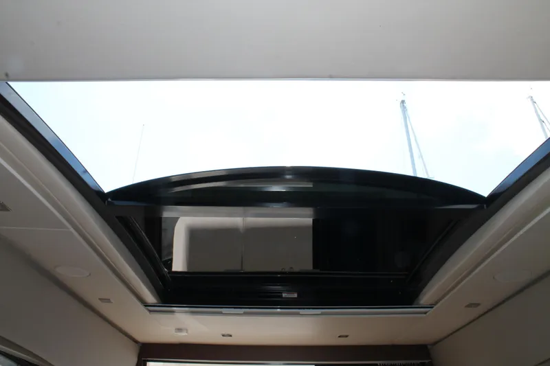 Slide: The Image of 2015 Sea Ray 470 Sundancer yacht sunroof, open view from interior. - 28