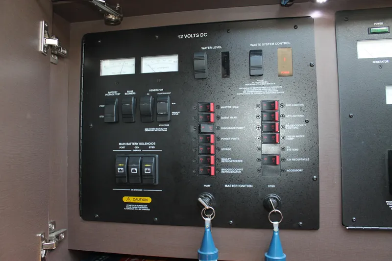 Slide: The Image of Electrical control panel on a 2015 Sea Ray 470 Sundancer yacht. - 43