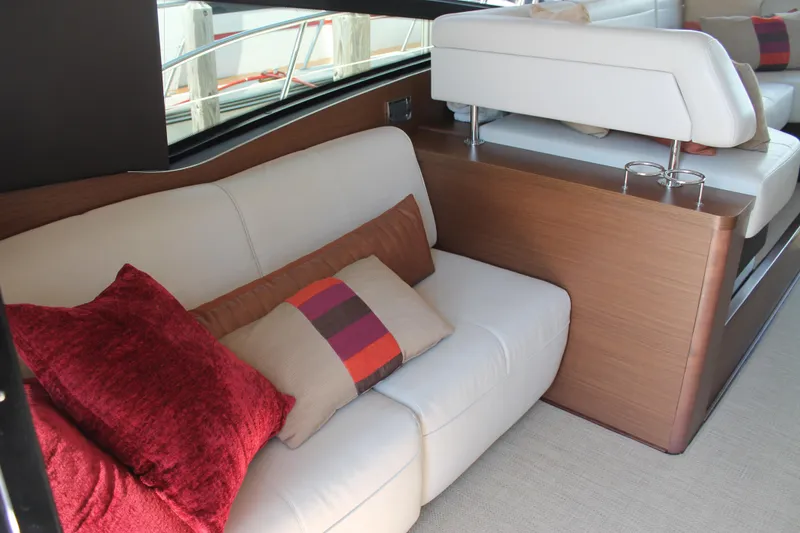 Slide: The Image of Luxurious interior of 2015 Sea Ray 470 Sundancer yacht with plush seating and cushions. - 6
