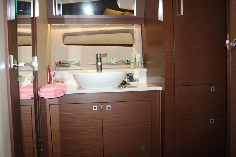 Slide: The Image of Luxurious bathroom interior of 2015 Sea Ray 470 Sundancer yacht with modern fixtures. - 98