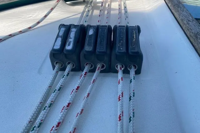 Slide: The Image of Rope clutches on 2003 Beneteau Oceanis Clipper 361 sailboat deck. - 12