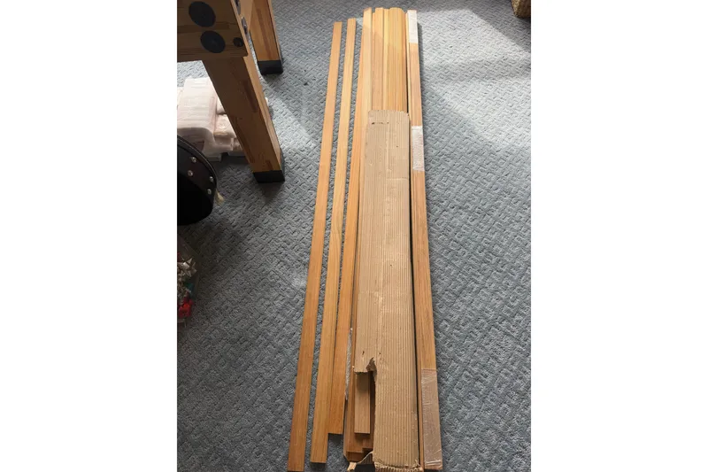 Slide: The Image of Wooden planks on carpet, possibly for Beneteau Oceanis Clipper 361, 2003 model. - 42