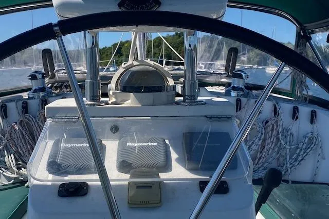 Slide: The Image of Cockpit of 2003 Beneteau Oceanis Clipper 361 sailboat with navigation equipment. - 6