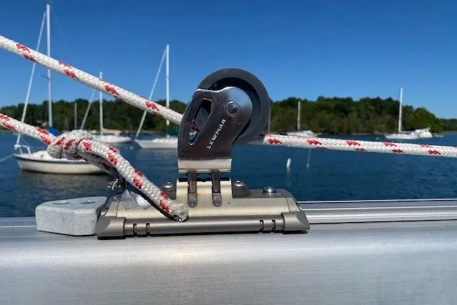 Slide: The Image of Close-up of a Beneteau Oceanis Clipper 361 sailboat rigging, 2003 model, with scenic marina background. - 9