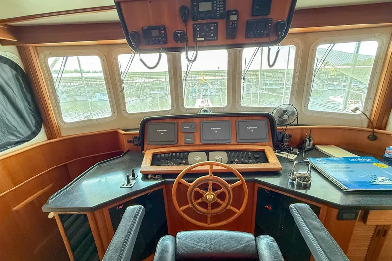 Slide: The Image of 2007 Nordic Tug 54 docked, named "Ring Leader," in Memphis, TN marina. - 16