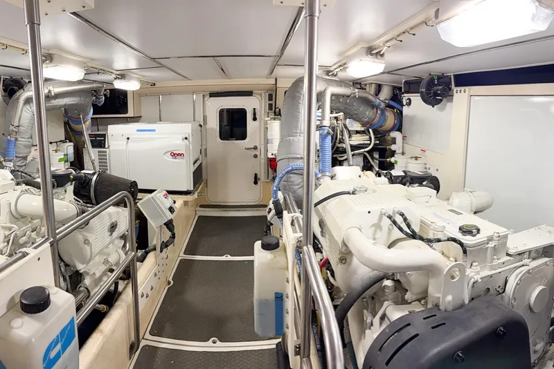 Slide: The Image of Pilot house of a 2007 Nordic Tug 54 with navigation equipment and steering wheel. - 28