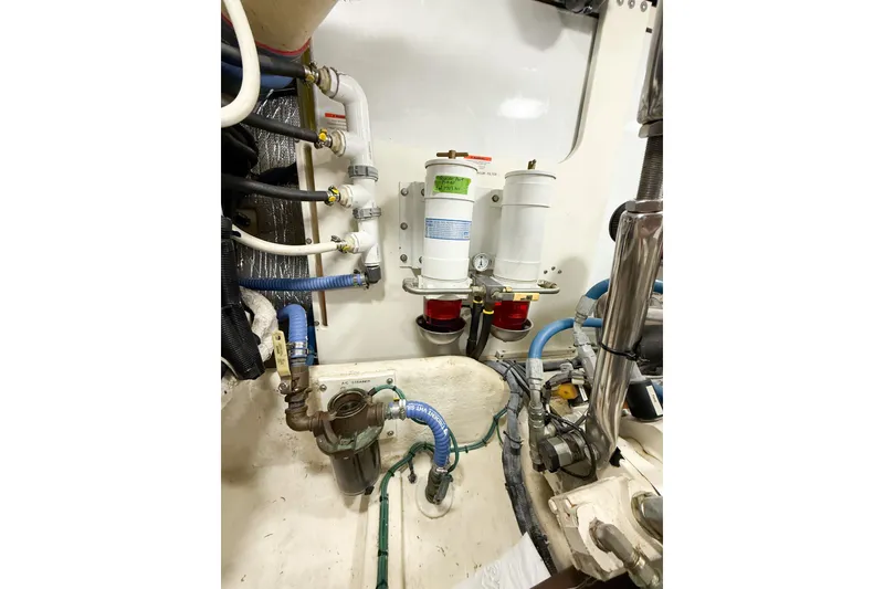 Slide: The Image of Luxurious 2007 Nordic Tug 54 interior with plush seating and elegant wood finishes. - 33