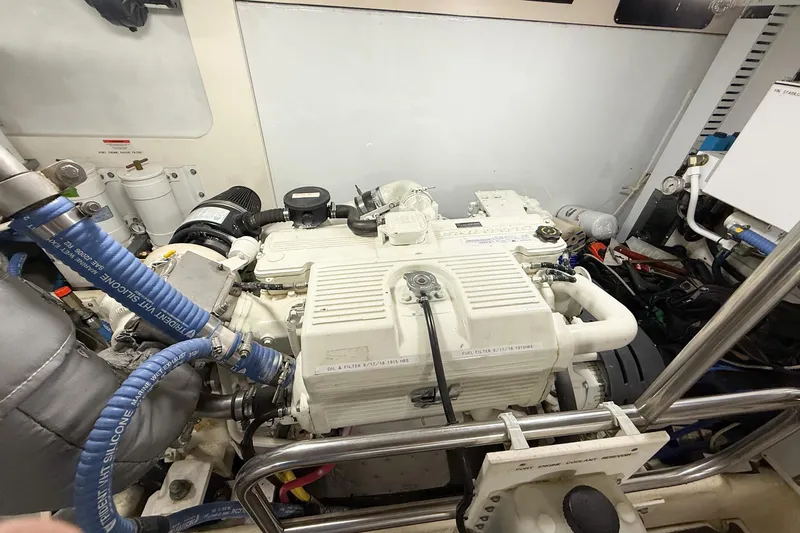 Slide: The Image of Engine room of a 2007 Nordic Tug 54, showcasing detailed machinery and components. - 49