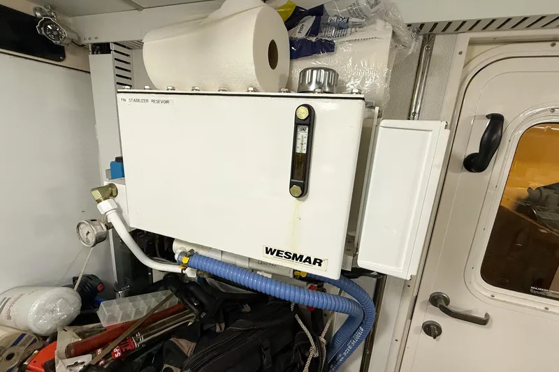 Slide: The Image of Engine room of 2007 Nordic Tug 54 with Wesmar stabilizer reservoir. - 51