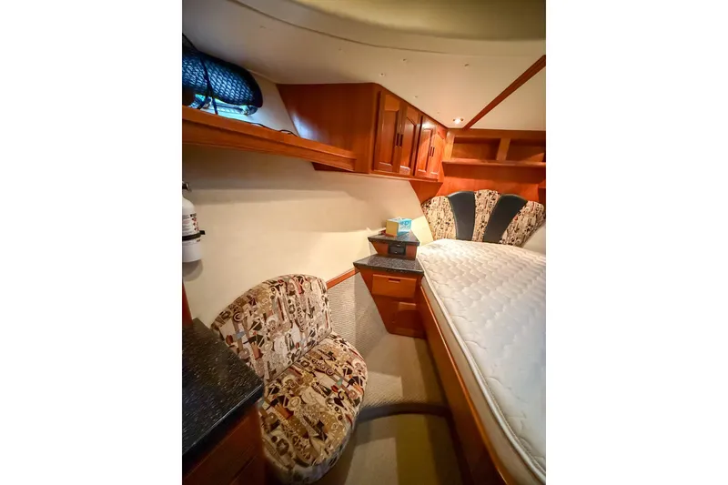Slide: The Image of Luxurious cabin interior of 2007 Nordic Tug 54 with elegant wood finishes. - 60