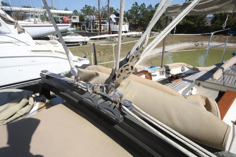 Slide: The Image of 1979 Westsail 32 Shipmaster sailboat deck with rigging and ropes. - 24