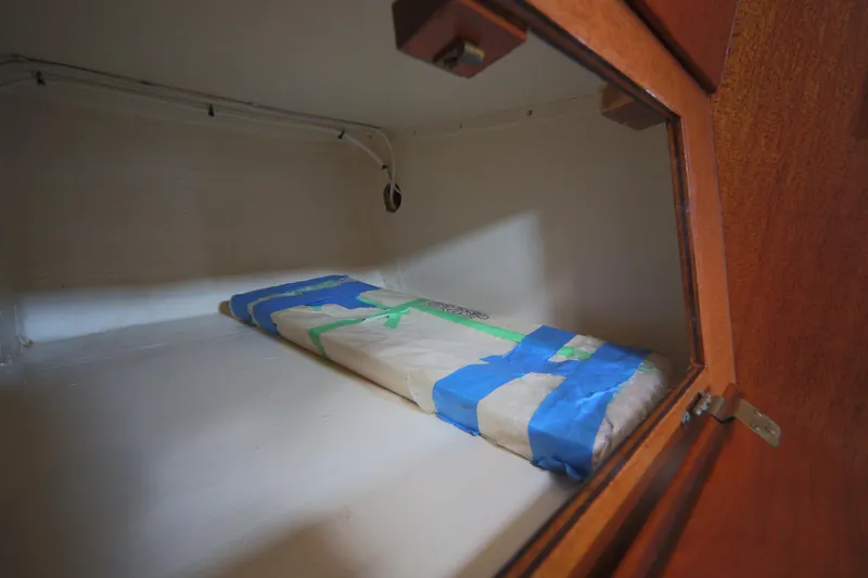 Slide: The Image of Interior storage compartment of 1979 Westsail 32 Shipmaster sailboat. - 48