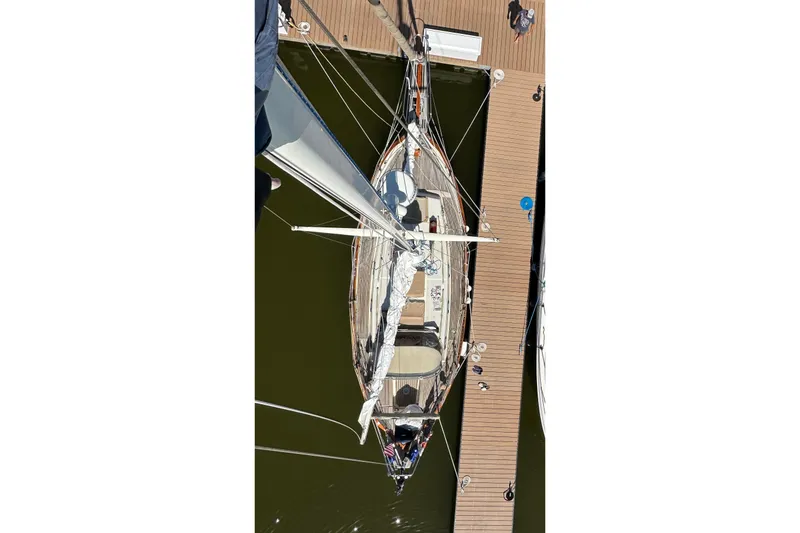 Slide: The Image of Overhead view of 1979 Westsail 32 Shipmaster docked at a marina. - 8