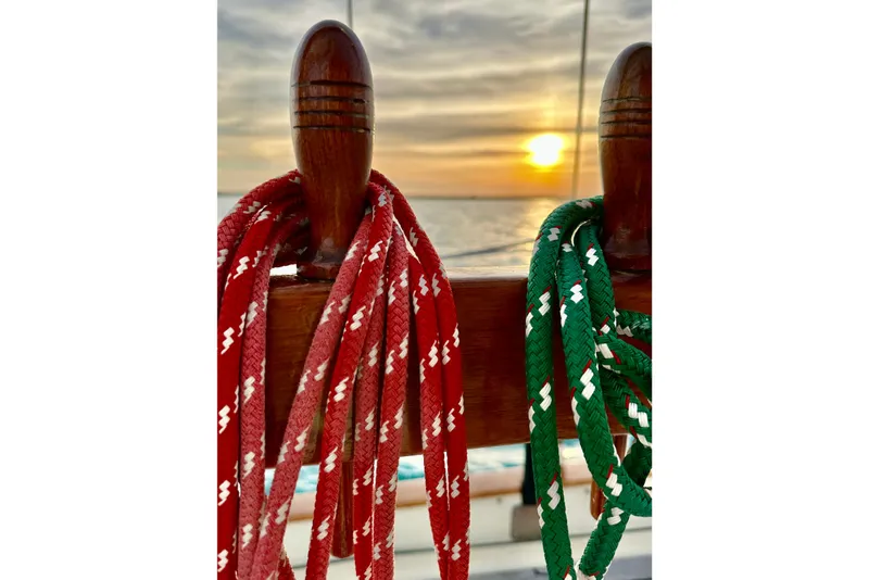Slide: The Image of Red and green ropes on a 1979 Westsail 32 Shipmaster at sunset. - 87